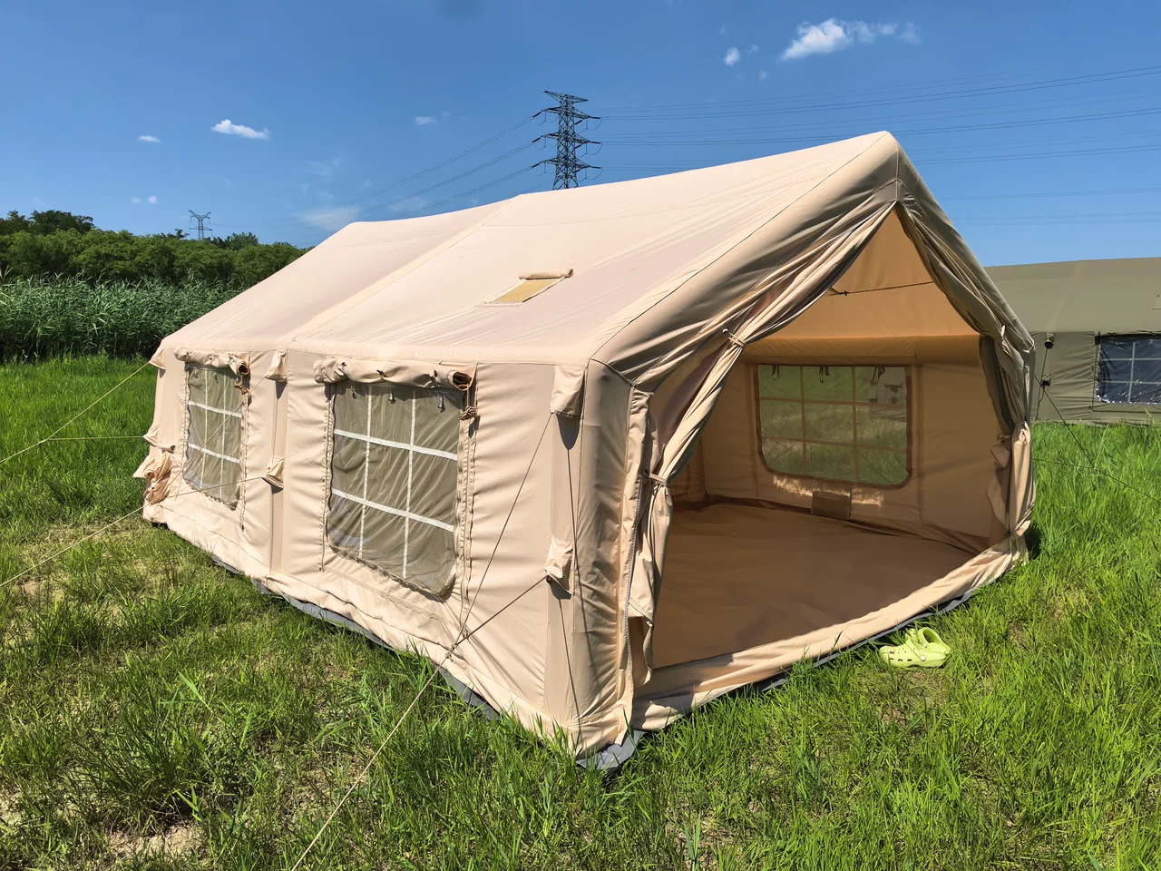 LT-18.16 inflatable camping tent with its front opening raised