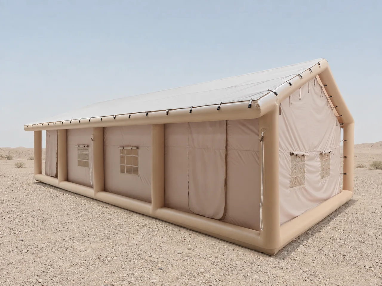 Long inflatable Majlis-style camping tent in a desert setting