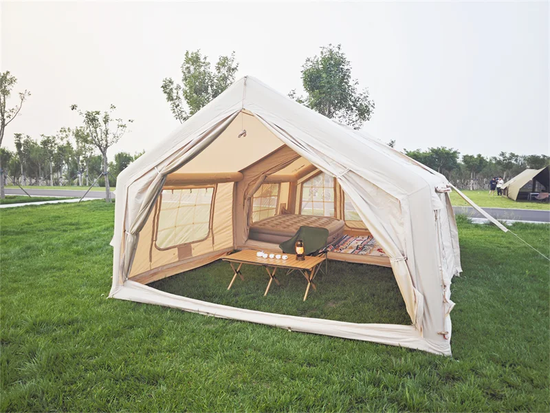 Open entrance and furnished interior of the modular inflatable tent